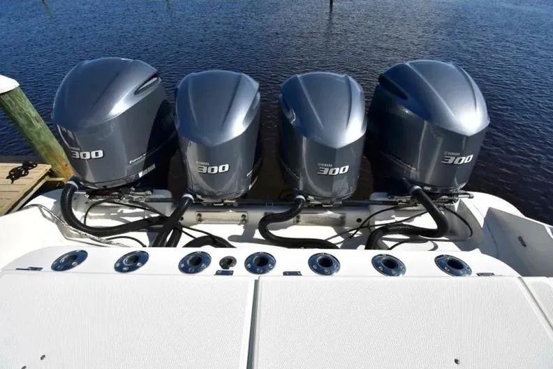 Slide: The Image of Four Yamaha 300 outboard engines on a 2012 Hydra-Sports 4200 Siesta boat. - 24