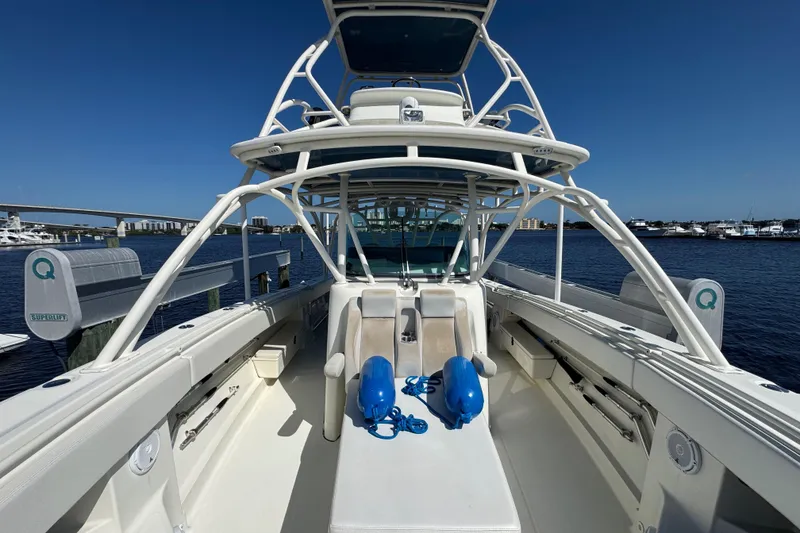 Slide: The Image of 2012 Hydra-Sports 4200 Siesta boat docked at marina, clear blue sky. - 39