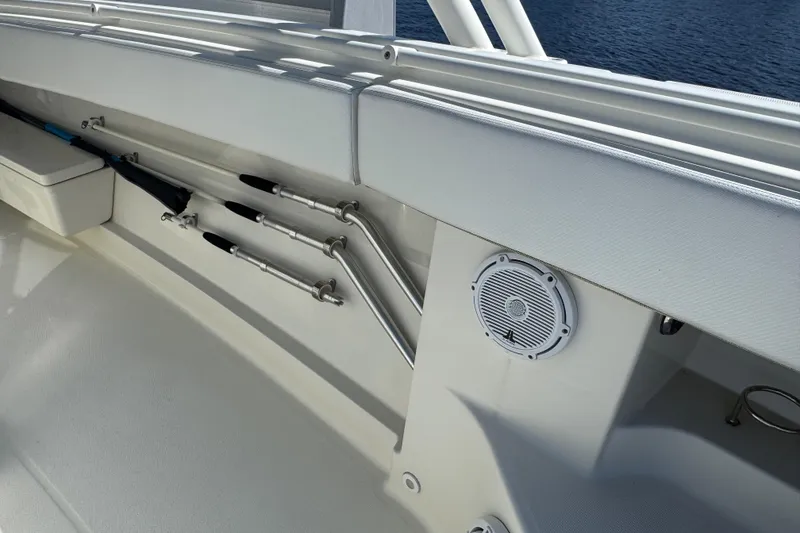 Slide: The Image of Interior view of 2012 Hydra-Sports 4200 Siesta boat with fishing rod holders and speaker. - 41