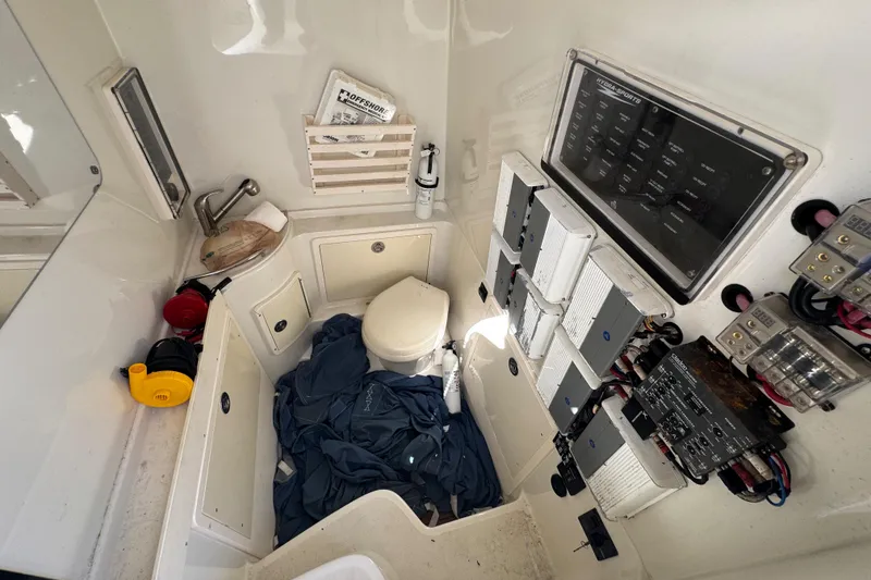 Slide: The Image of 2012 Hydra-Sports 4200 Siesta boat interior with control panel, storage, and equipment. - 42