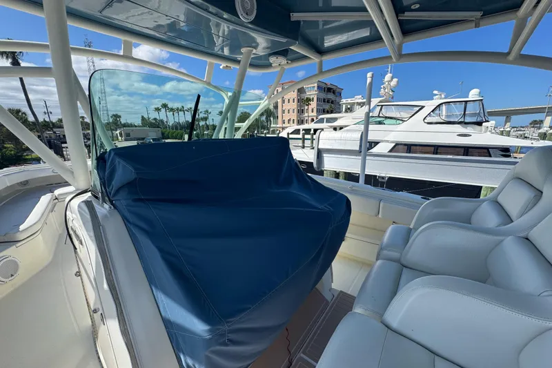 Slide: The Image of 2012 Hydra-Sports 4200 Siesta boat interior with covered console and luxurious seating. - 44