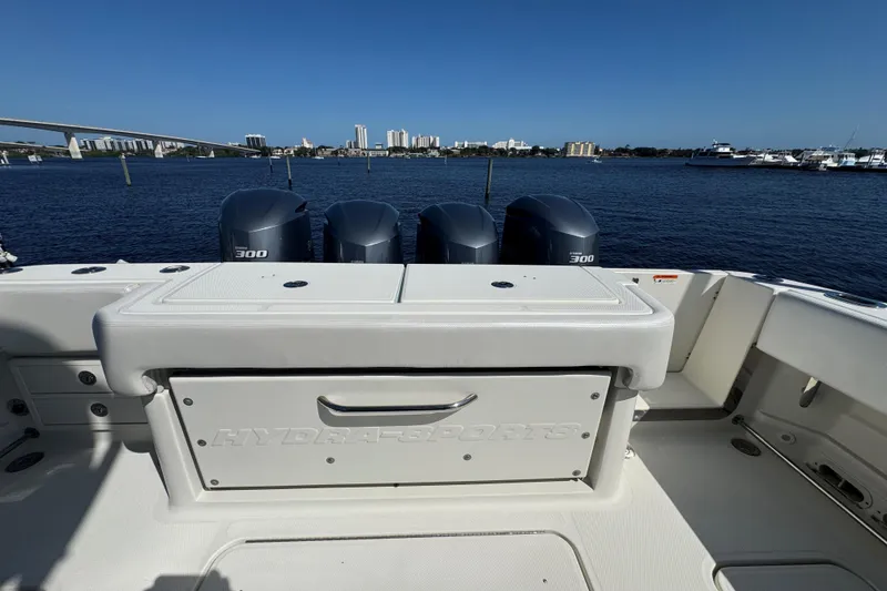 Slide: The Image of 2012 Hydra-Sports 4200 Siesta boat with triple 300 horsepower engines on a sunny day. - 46