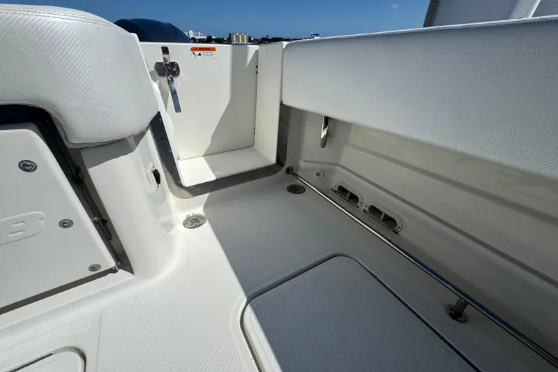 Slide: The Image of Interior view of 2012 Hydra-Sports 4200 Siesta boat, showcasing seating and storage. - 55
