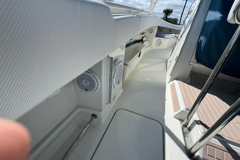 Slide: The Image of 2012 Hydra-Sports 4200 Siesta boat interior with speakers and seating area. - 57