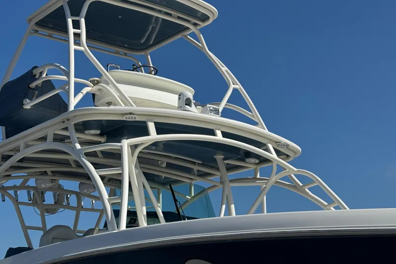 Slide: The Image of 2012 Hydra-Sports 4200 Siesta boat tower against clear blue sky. - 7