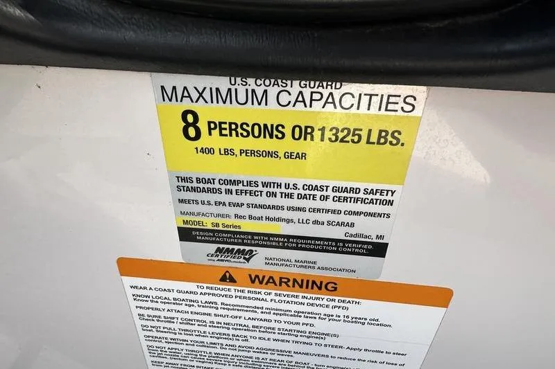 Slide: The Image of U.S. Coast Guard capacity label for 2016 Scarab 195 H.O., max 8 persons or 1325 lbs. - 13