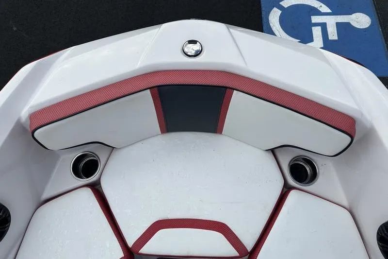 Slide: The Image of 2016 Scarab 195 H.O. boat interior with red and white seating, near handicap parking. - 22