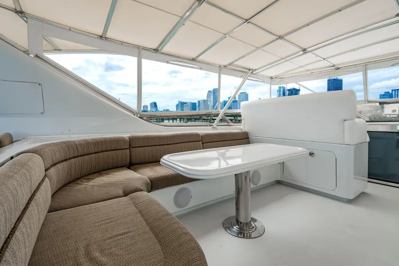 Slide: The Image of Luxurious 2000 Destiny Flybridge Motor Yacht interior with city skyline view. - 18