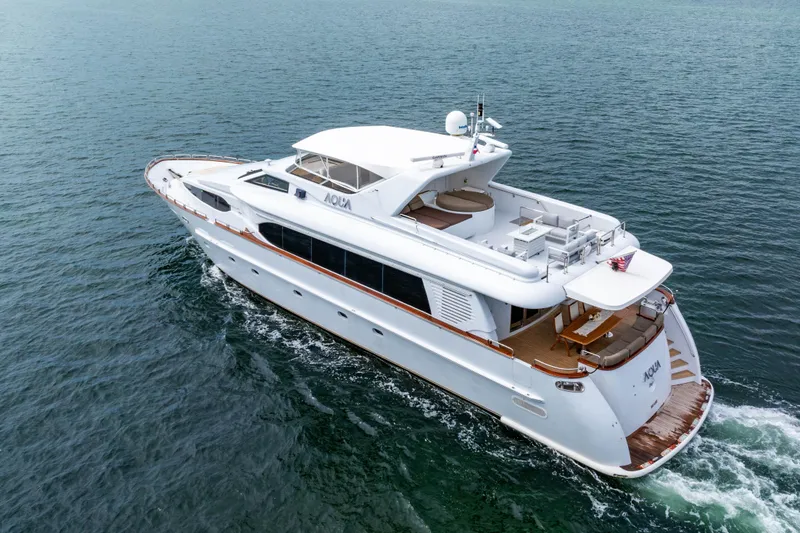 Slide: The Image of Elegant 2000 Destiny Flybridge Motor Yacht cruising on open water. - 27