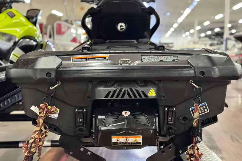 Slide: The Image of 2021 Sea-Doo GTR 230 rear view in showroom, showcasing design and features. - 3