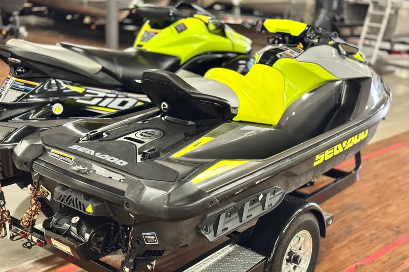 Slide: The Image of 2021 Sea-Doo GTR 230 jet ski with vibrant yellow and black design on display. - 5