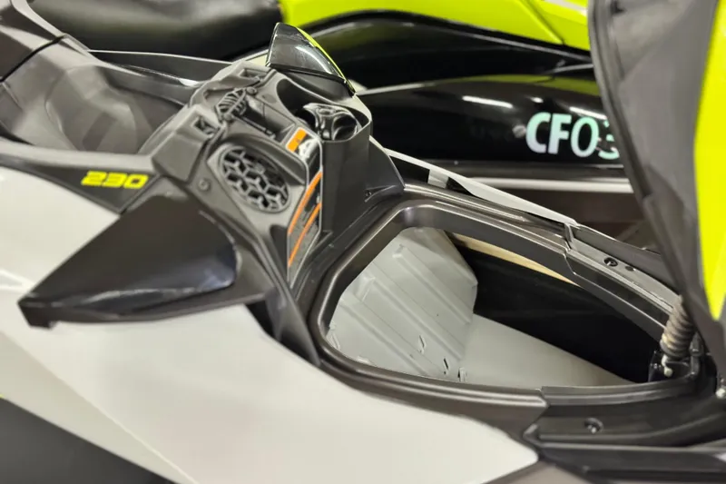 Slide: The Image of 2021 Sea-Doo GTR 230 jet ski with open storage compartment, showcasing sleek design. - 9