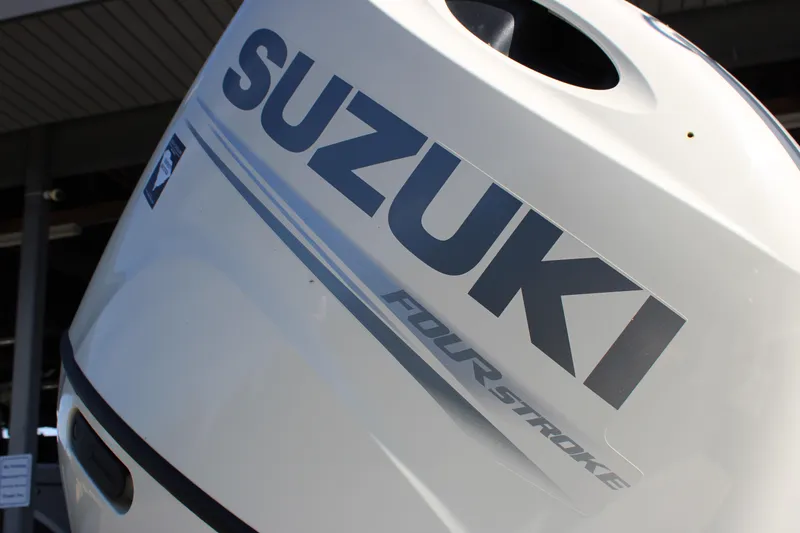 Slide: The Image of Suzuki four-stroke engine on a 2020 Stingray 192SC boat. - 22