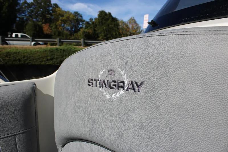 Slide: The Image of Stingray 192SC 2020 boat seat with embroidered logo, outdoor setting. - 8