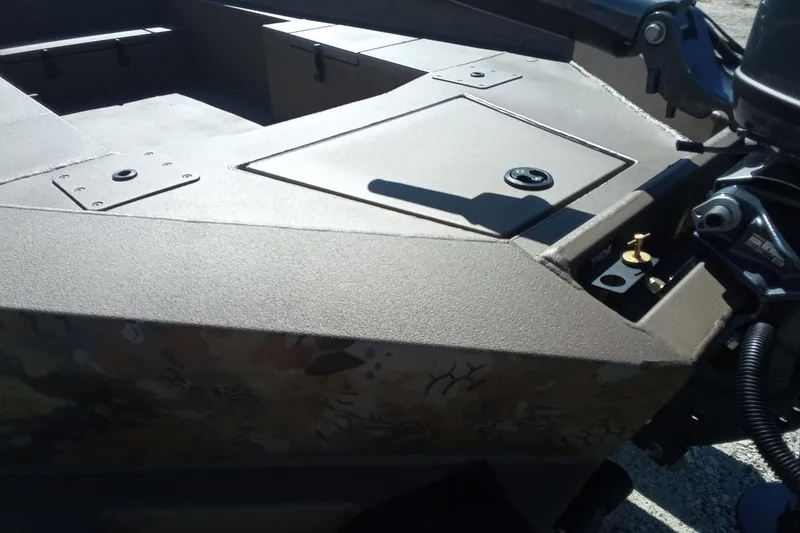 Slide: The Image of 2026 Thor 1754 Fish Hammer boat, featuring a sturdy deck and motor components. - 15