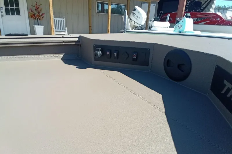 Slide: The Image of 2026 Thor 1754 Fish Hammer boat interior with control panel and seating area. - 7