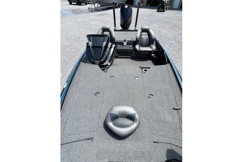 Slide: The Image of 2021 Nitro Z19 boat interior with gray seating and spacious deck. - 3