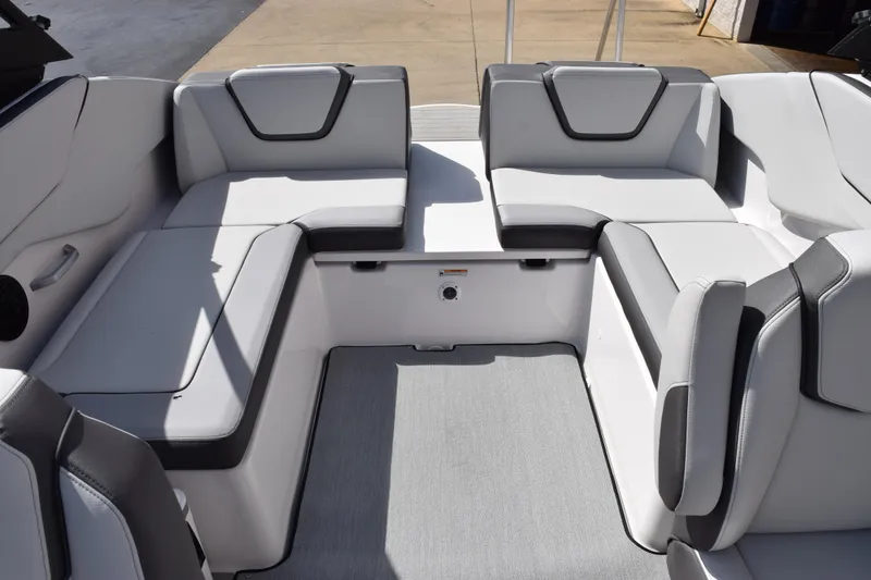 Slide: The Image of 2026 Yamaha Boats AR250 interior seating with modern design and comfortable upholstery. - 11