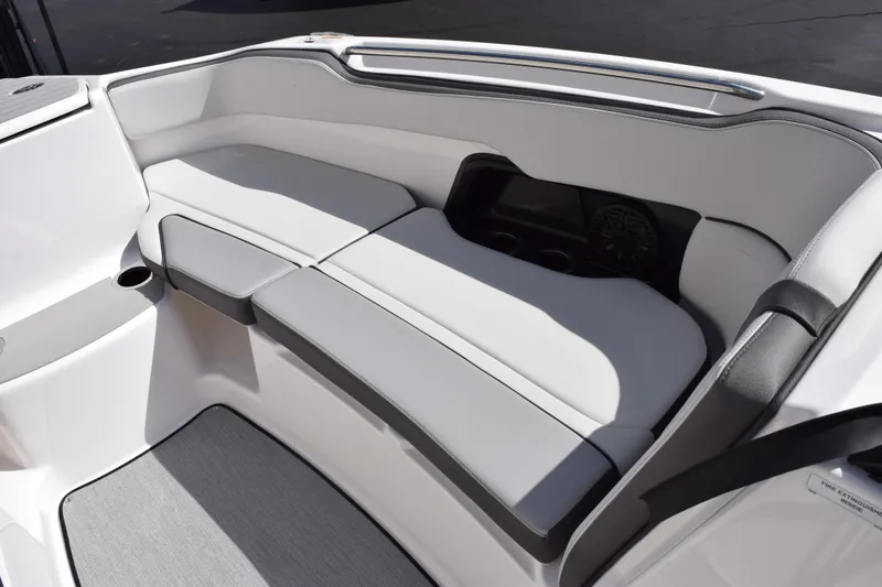 Slide: The Image of 2026 Yamaha Boats AR250 interior seating with sleek, modern design and comfortable upholstery. - 16