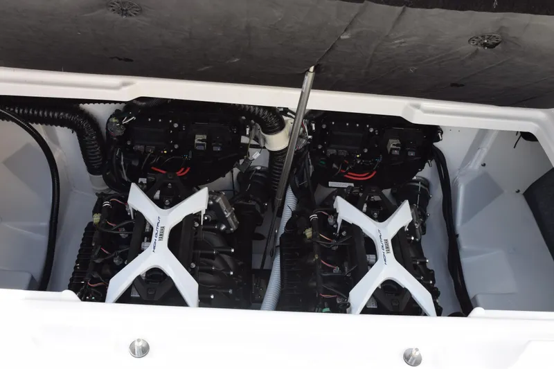 Slide: The Image of 2026 Yamaha AR250 boat engine compartment with dual engines and wiring. - 22