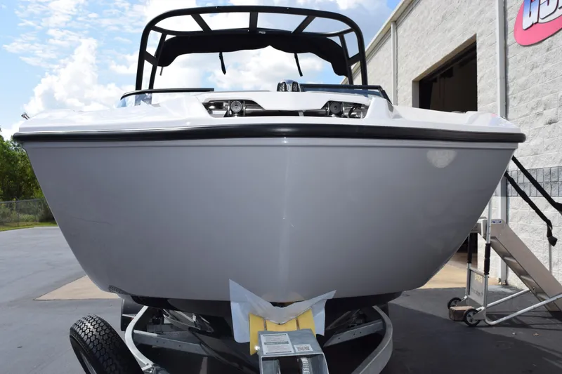Slide: The Image of 2026 Yamaha Boats AR250 on trailer, front view, outdoors. - 3