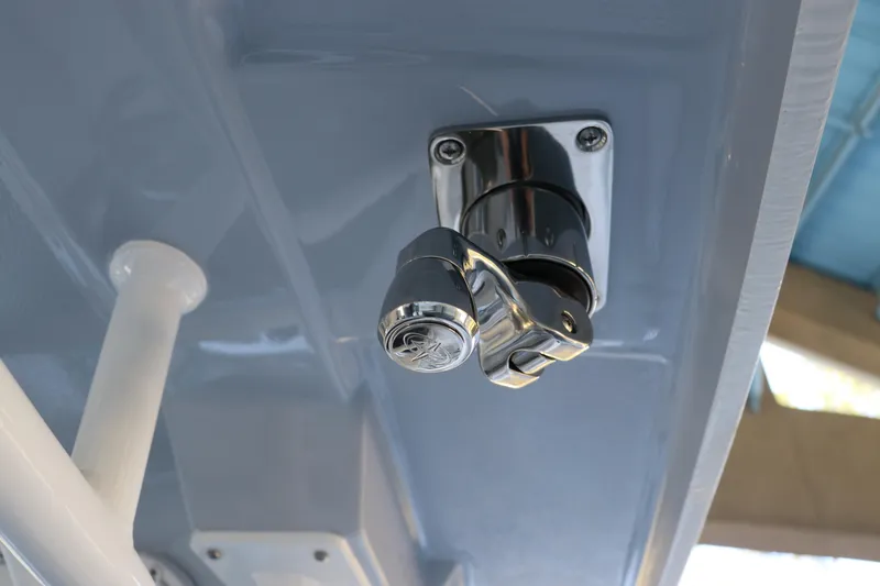Slide: The Image of 2026 Robalo R250 Center Console boat detail, featuring a chrome fixture on the ceiling. - 29
