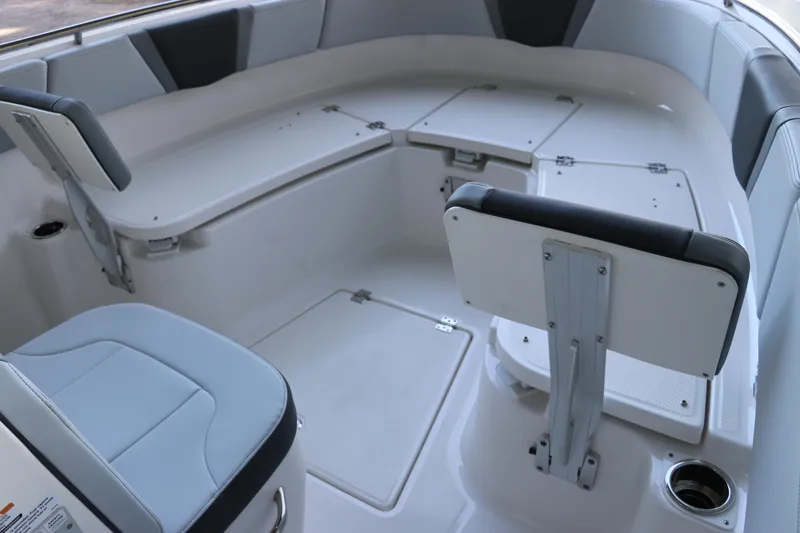 Slide: The Image of 2026 Robalo R250 Center Console boat interior with seating and storage compartments. - 51