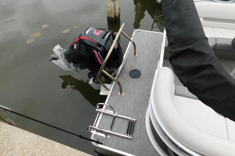 Slide: The Image of 2021 Godfrey Sweetwater 2286 SBX pontoon boat with outboard motor and swim ladder. - 15