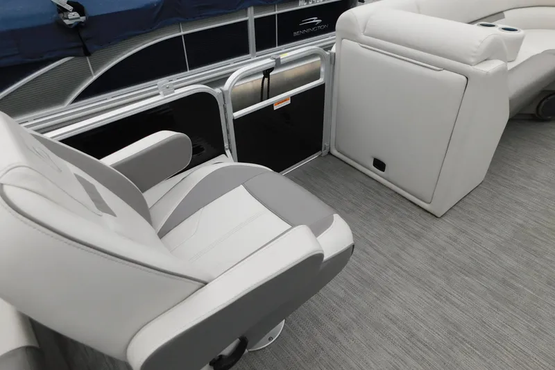 Slide: The Image of 2021 Godfrey Sweetwater 2286 SBX boat interior with gray and white seating. - 22