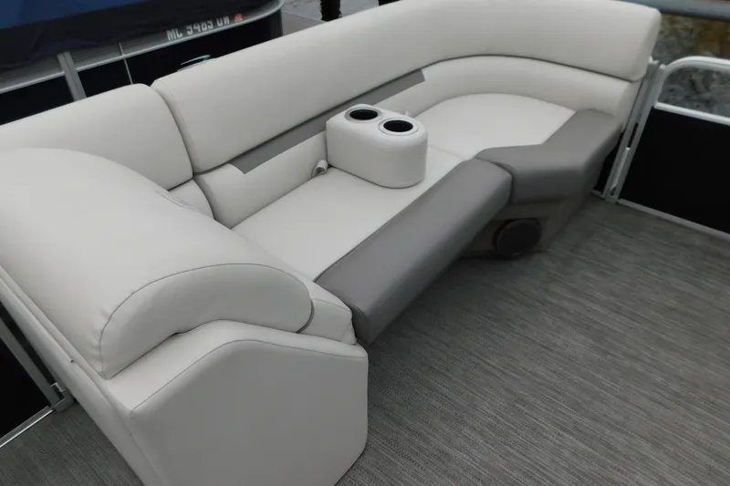 Slide: The Image of 2021 Godfrey Sweetwater 2286 SBX boat interior with cushioned seating and cup holders. - 25