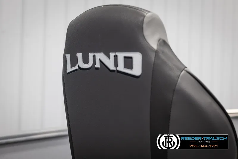 Slide: The Image of Black seat with "Lund" logo on 2026 Lund 1600 Fury Tiller boat. - 20