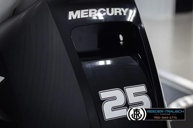 Slide: The Image of Mercury 25 outboard motor on 2026 Lund 1600 Fury Tiller boat. - 25