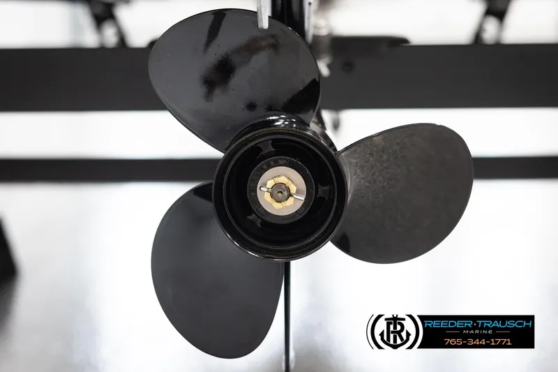 Slide: The Image of Close-up of a black propeller on a 2026 Lund 1600 Fury Tiller boat. - 26