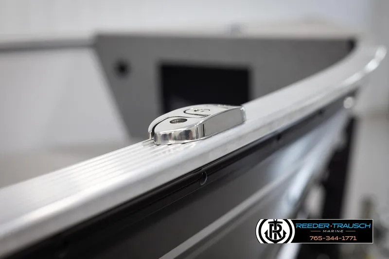 Slide: The Image of 2026 Lund 1600 Fury Tiller boat detail with Reeder-Trausch Marine logo. - 31