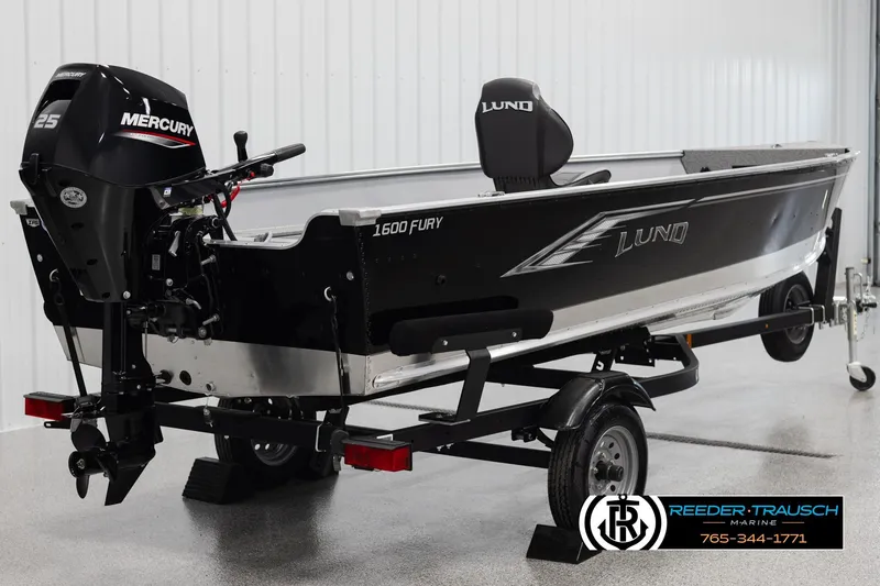 Slide: The Image of 2026 Lund 1600 Fury Tiller boat with Mercury 25 engine on trailer. - 4