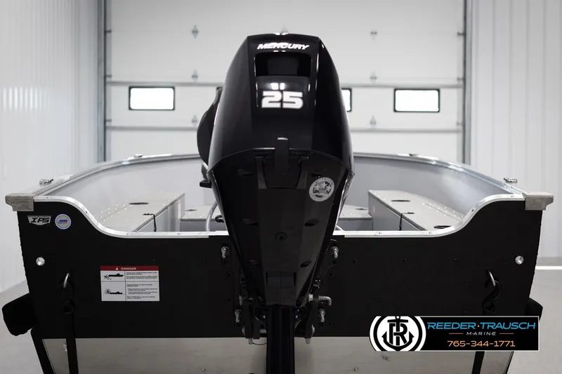 Slide: The Image of 2026 Lund 1600 Fury Tiller boat with Mercury 25 engine in showroom. - 5