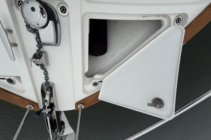 Slide: The Image of 2023 Sabre 43 Salon Express anchor chain and storage compartment detail. - 17