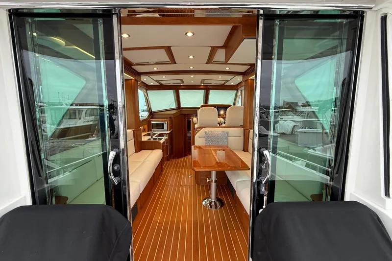 Slide: The Image of Interior view of 2023 Sabre 43 Salon Express yacht, featuring elegant wood finishes and modern design. - 26