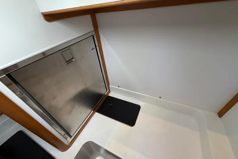 Slide: The Image of Interior of 2023 Sabre 43 Salon Express yacht with stainless steel appliance. - 36