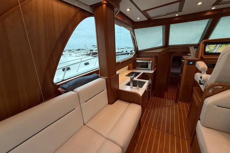 Slide: The Image of Luxurious interior of 2023 Sabre 43 Salon Express yacht with elegant wood finish. - 39