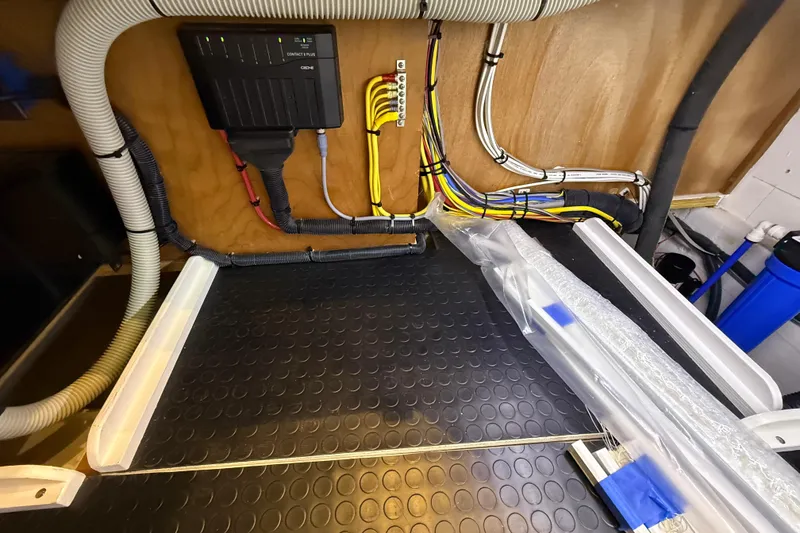 Slide: The Image of Electrical wiring setup in 2023 Sabre 43 Salon Express yacht interior. - 54