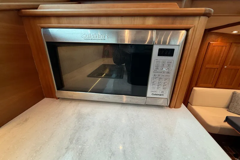 Slide: The Image of Cuisinart microwave in 2023 Sabre 43 Salon Express yacht kitchen interior. - 58