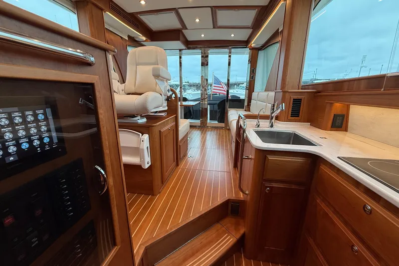Slide: The Image of Luxurious interior of 2023 Sabre 43 Salon Express yacht with elegant wood finishes. - 82