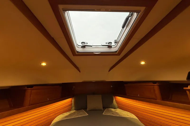 Slide: The Image of Luxurious interior of 2023 Sabre 43 Salon Express with skylight and ambient lighting. - 90