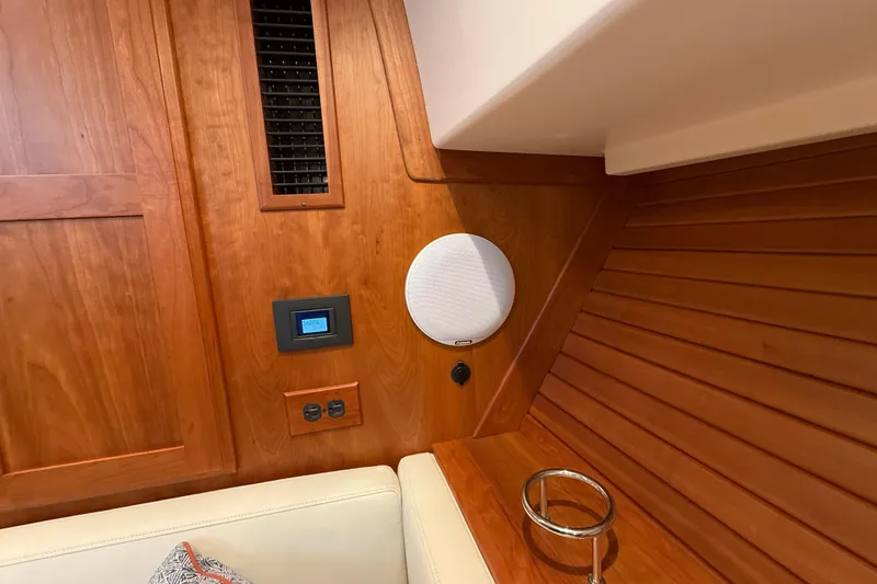 Slide: The Image of Interior of 2023 Sabre 43 Salon Express with wood paneling and modern amenities. - 95