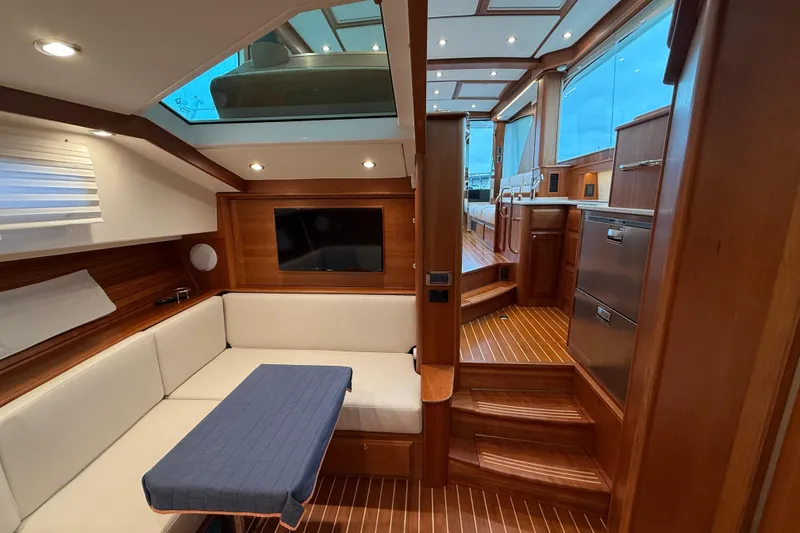 Slide: The Image of 2023 Sabre 43 Salon Express interior with elegant wood finish and modern amenities. - 96