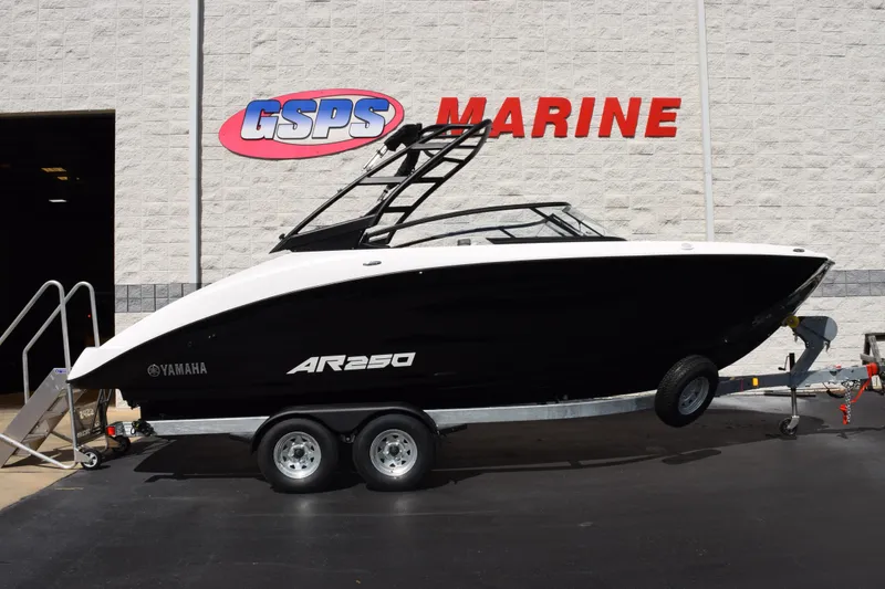 The Image of 2026 Yamaha Boats AR250 on trailer at GSPS Marine dealership. - 1