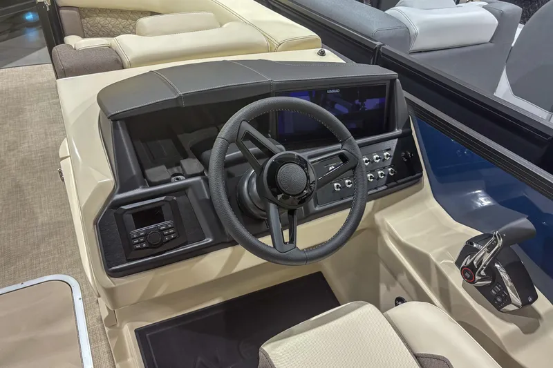 Slide: The Image of Steering console of 2026 Alera M23Q boat with modern controls and navigation system. - 12