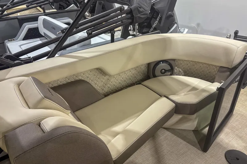 Slide: The Image of Luxurious seating in 2026 Alera M23Q boat, featuring elegant beige and brown upholstery. - 14
