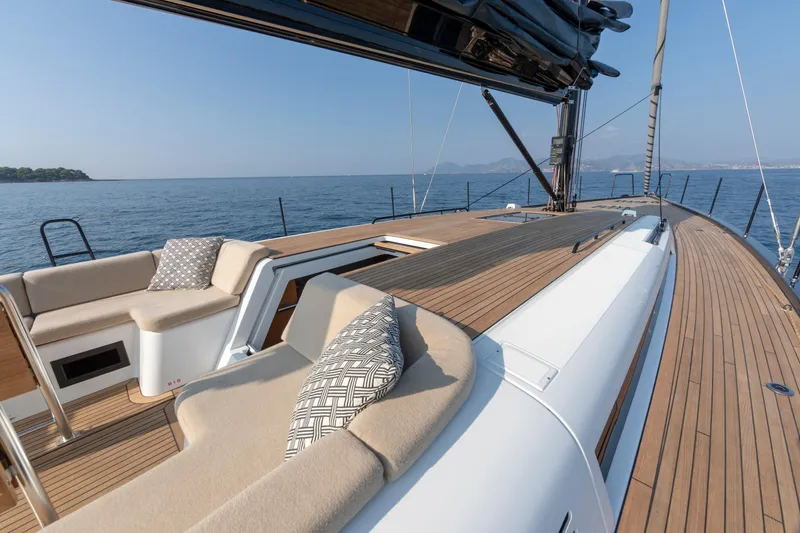 Slide: The Image of Luxurious 2026 Beneteau First 53 yacht deck with elegant seating and ocean view. - 37